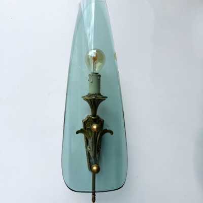 Mid-century modernist wall sconces, glass and gilded bronze lighting sconces. In the atmosphere of Pietro Chiesa for the Italian design factory Fontana Arte. Famous designs like Reggiani, Sciolari, Francesco Buzzi Ceriani, Angelo Brotto for Esperia, Aldo Carlo Nason for Mazzega, Venini, Vistosi, La Murrina, Toni Zuccheri, Fontana Arte, Artemide, Arteluce, Arredoluce, Luigi Caccia Dominioni, Stilnovo.