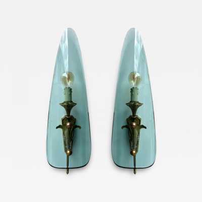 Mid-century modernist wall sconces, glass and gilded bronze lighting sconces. In the atmosphere of Pietro Chiesa for the Italian design factory Fontana Arte. Famous designs like Reggiani, Sciolari, Francesco Buzzi Ceriani, Angelo Brotto for Esperia, Aldo Carlo Nason for Mazzega, Venini, Vistosi, La Murrina, Toni Zuccheri, Fontana Arte, Artemide, Arteluce, Arredoluce, Luigi Caccia Dominioni, Stilnovo.