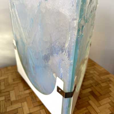 Pair of Mid-Century Modern Space Age table lamps in opalescent sky blue textured Murano glass blade and white lacquered metal base by the Leucos factory. Famous Italian design like Venini, Vistosi, La Murrina, Aldo Carlo Nason for Mazzega, Stilnovo, Joe Colombo, Arteluce, Arredoluce, Lumi, Luci, Rggiani, Sciolari, Werner Pantone, Luigi Colani, Raak, Angelo Lelii, Angelo Brotto, Esperia, Francesco Bocola, Superstudio, Enrico Tronconi, Mario Bellini, Harvey Guzzini, Luigi Massoni, Martinelli, P