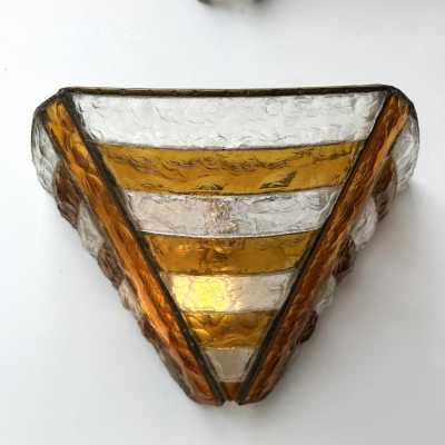 Mid-century wall sconces in hammered glass and wrought iron, with a gold and copper patina, in the brutalist style, made by the Italian manufacturer Longobard, a competitor of Biancardi Jordan in Verona and Poliarte in the 1970s. Famous designers, such as Carlo Aldo Nason for Mazzega Murano, Venini, Vistosi, La Murrina, Esperia and Angelo Brotto.