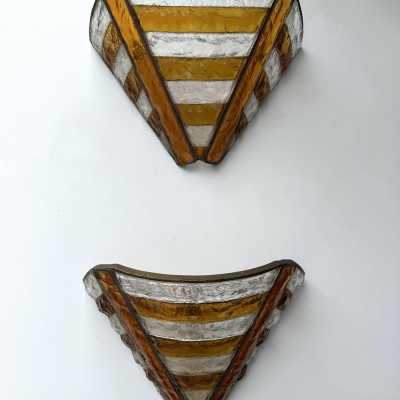Mid-century wall sconces in hammered glass and wrought iron, with a gold and copper patina, in the brutalist style, made by the Italian manufacturer Longobard, a competitor of Biancardi Jordan in Verona and Poliarte in the 1970s. Famous designers, such as Carlo Aldo Nason for Mazzega Murano, Venini, Vistosi, La Murrina, Esperia and Angelo Brotto.
