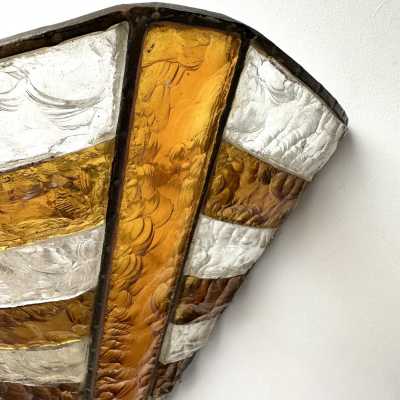 Mid-century wall sconces in hammered glass and wrought iron, with a gold and copper patina, in the brutalist style, made by the Italian manufacturer Longobard, a competitor of Biancardi Jordan in Verona and Poliarte in the 1970s. Famous designers, such as Carlo Aldo Nason for Mazzega Murano, Venini, Vistosi, La Murrina, Esperia and Angelo Brotto.
