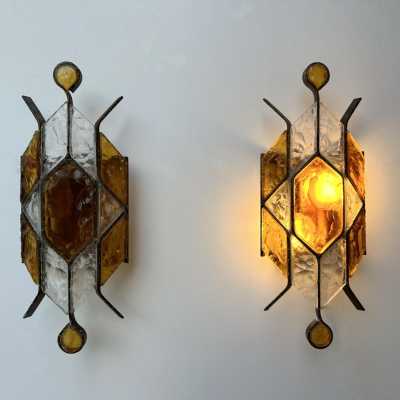 Pair of Mid-Century Modern wall sconces in amber and clear hammered glass and wrought iron, gilded copper patina, from the Longobard manufacture in Verona in a brutalist style, competitor of Biancardi Jordan Arte and Poliarte in the 1970s. Famous design like Carlo Aldo Nason for Mazzega Murano, Venini, Vistosi, La Murrina, Esperia, Angelo Brotto.