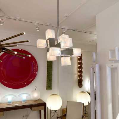 Cube-shaped pendant chandelier in blue opaline Murano glass and chrome-plated metal, manufactured by Mazzega. Designs by major brands such as Venini, Vistosi, La Murrina, Poliarte, Carlo Aldo Nason, and Toni Zuccheri.