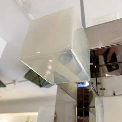 Cube-shaped pendant chandelier in blue opaline Murano glass and chrome-plated metal, manufactured by Mazzega. Designs by major brands such as Venini, Vistosi, La Murrina, Poliarte, Carlo Aldo Nason, and Toni Zuccheri.
