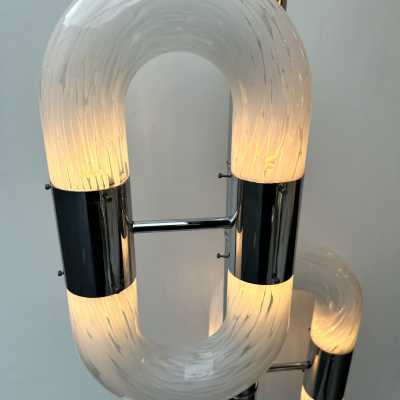 Vintage chrome metal version of the chain floor lamp by Aldo Nason for the Mazzega factory. Blown white Murano glass. Famous manufactory like Venini, Vistosi, La Murrina, Seguso, Carlo Nason, Poliarte, Esperia, Angelo Brotto, Stilnovo, Arteluce, Arredoluce, Artemide, Pierre Cardin, Lumi, Luci, Raak, Angelo Lelii, Francesco Bocola, Superstudio, Enrico Tronconi, Mario Bellini, Harvey Guzzini, Luigi Massoni, Martinelli, Fabio Lenci, Gio Ponti.