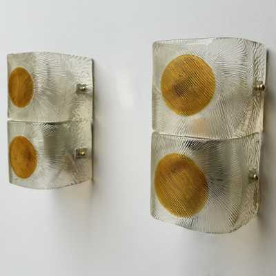 Pair of mid-century modern space age wall sconces in orange and clear textured Murano glass by the Mazzega factory. Famous Italian design like Venini, Vistosi, La Murrina, Aldo Carlo Nason, Toni Zuccheri, Stilnovo, Joe Colombo, Arteluce, Arredoluce, Lumi, Luci, Rggiani, Sciolari, Werner Pantone, Luigi Colani, Raak, Angelo Lelii, Angelo Brotto, Esperia, Francesco Bocola, Superstudio, Enrico Tronconi, Mario Bellini, Harvey Guzzini, Luigi Massoni, Martinelli, Pierre Cardin, Fabio Lenci, Gi