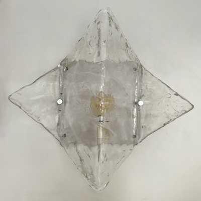 Mid-Century Modern Space Age wall light model LP253 in clear textured Murano glass and white lacquered metal by Carlo Nason for the Mazzega factory. Famous Italian design like Venini, Vistosi, La Murrina, Aldo Nason, Stilnovo, Joe Colombo, Arteluce, Arredoluce, Lumi, Luci, Rggiani, Sciolari, Werner Pantone, Luigi Colani, Raak, Angelo Lelii, Angelo Brotto, Esperia, Francesco Bocola, Superstudio, Enrico Tronconi, Mario Bellini, Harvey Guzzini, Luigi Massoni, Martinelli, Pierre Cardin, Fabio Lenci, G