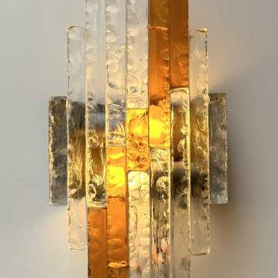 Mid-century Space Age wall lights in hammered glass and metal, in the Brutalist style, manufactured by the Poliarte factory in Verona, a competitor of Longobard Arte and Biancardi Jordan in the 1970s. Famous designers, such as Carlo Aldo Nason for Mazzega Murano, Venini, Vistosi, La Murrina, Esperia and Angelo Brotto.