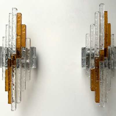 Mid-century Space Age wall lights in hammered glass and metal, in the Brutalist style, manufactured by the Poliarte factory in Verona, a competitor of Longobard Arte and Biancardi Jordan in the 1970s. Famous designers, such as Carlo Aldo Nason for Mazzega Murano, Venini, Vistosi, La Murrina, Esperia and Angelo Brotto.