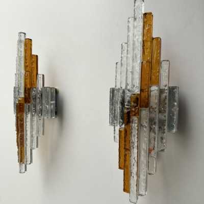 Mid-century Space Age wall lights in hammered glass and metal, in the Brutalist style, manufactured by the Poliarte factory in Verona, a competitor of Longobard Arte and Biancardi Jordan in the 1970s. Famous designers, such as Carlo Aldo Nason for Mazzega Murano, Venini, Vistosi, La Murrina, Esperia and Angelo Brotto.