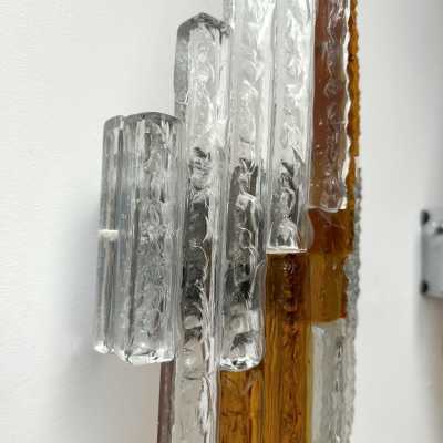Mid-century Space Age wall lights in hammered glass and metal, in the Brutalist style, manufactured by the Poliarte factory in Verona, a competitor of Longobard Arte and Biancardi Jordan in the 1970s. Famous designers, such as Carlo Aldo Nason for Mazzega Murano, Venini, Vistosi, La Murrina, Esperia and Angelo Brotto.