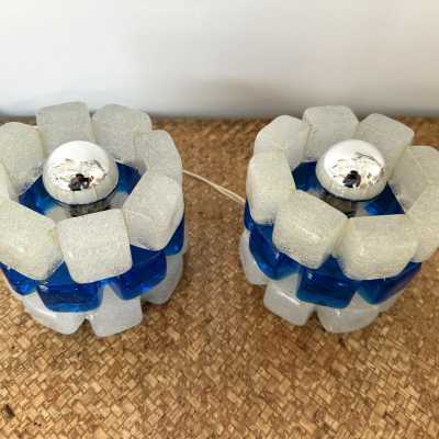 Pair of mid-century modern round cubic cylindrical lamps, designed by Italian manufacturer Poliarte. Pressed bubble glass with blue detail. Manufacture of famous publishers such as Venini, Vistosi, La Murrina, Seguso, Aldo Nason, Carlo Aldo Nason for Mazzega, Stilnovo, Arteluce, Arredoluce, Artemide, Pierre Cardin, Lumi, Luci, RAAK, Angelo Lelii, Francesco Bocola, Superstudio, Enrico Tronconi, Mario Bellini, Harvey Guzzini, Luigi Massoni, Martinelli, Fabio Lenci, Gio Ponti.