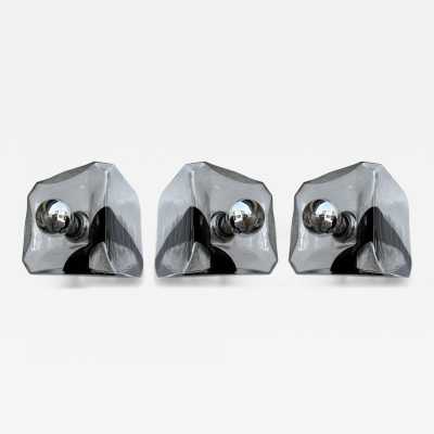 Wall or ceiling light in Space Age or Mid-Century Modern style. Cube made of blown Murano glass and chrome-plated metal. Famous designs: Carlo Aldo Nason for Mazzega, Venini, Leucos, La Murrina, Poliarte, Veronese, Seguso, Stilnovo, Artemide, Arredoluce, and Arteluce.