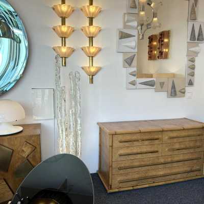 Chest of drawers from Vivai Del Sud, featuring a beautiful blend of bamboo, rattan, raffia, and wide brass handles. Designed by renowned designers such as Renato Zevi, Romeo Rega, Maison Jansen, Willy Rizzo, Mario Sabot, Hollywood Regency, Esperia, and Galerie Maison & Jardin.