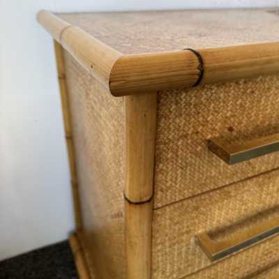 Chest of drawers from Vivai Del Sud, featuring a beautiful blend of bamboo, rattan, raffia, and wide brass handles. Designed by renowned designers such as Renato Zevi, Romeo Rega, Maison Jansen, Willy Rizzo, Mario Sabot, Hollywood Regency, Esperia, and Galerie Maison & Jardin.