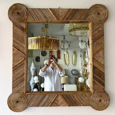 Large mid-century Hollywood Regency wall mirror made of bamboo, rattan, raffia, and wicker by the Italian manufacturer Vivai del Sud. Original manufacturer stamp on the back. Famous designs by Maison Arpex International, Dal Vera, Renato Zevi, Romeo Rega, Maison Jansen, brass palm, and Mario Sabot.