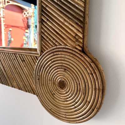 Large mid-century Hollywood Regency wall mirror made of bamboo, rattan, raffia, and wicker by the Italian manufacturer Vivai del Sud. Original manufacturer stamp on the back. Famous designs by Maison Arpex International, Dal Vera, Renato Zevi, Romeo Rega, Maison Jansen, brass palm, and Mario Sabot.