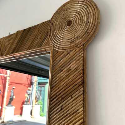 Large mid-century Hollywood Regency wall mirror made of bamboo, rattan, raffia, and wicker by the Italian manufacturer Vivai del Sud. Original manufacturer stamp on the back. Famous designs by Maison Arpex International, Dal Vera, Renato Zevi, Romeo Rega, Maison Jansen, brass palm, and Mario Sabot.