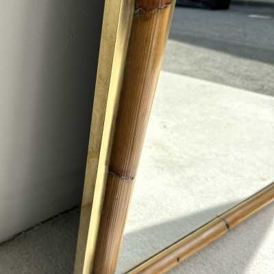 Wall mirror made of brass and bamboo, rattan, raffia, and wicker, from the Italian manufacturer Vivai del Sud. Original manufacturer's stamp on the back. Famous designs by Maison Arpex International, Dal Vera, Renato Zevi, Romeo Rega, Maison Jansen, brass palm tree, and Mario Sabot.