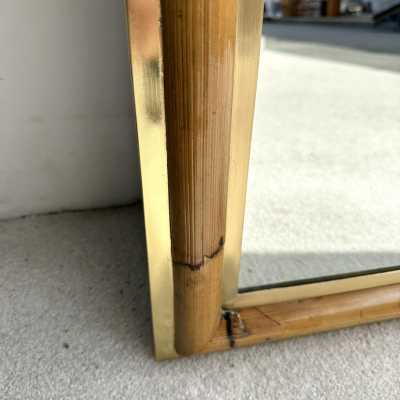 Wall mirror made of brass and bamboo, rattan, raffia, and wicker, from the Italian manufacturer Vivai del Sud. Original manufacturer's stamp on the back. Famous designs by Maison Arpex International, Dal Vera, Renato Zevi, Romeo Rega, Maison Jansen, brass palm tree, and Mario Sabot.