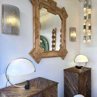 Large mid-century Hollywood Regency wall mirror made of bamboo, rattan, raffia, and wicker by the Italian manufacturer Vivai del Sud. Original manufacturer stamp on the back. Famous designs by Maison Arpex International, Dal Vera, Renato Zevi, Romeo Rega, Maison Jansen, brass palm, and Mario Sabot.