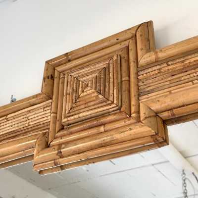 Large mid-century Hollywood Regency wall mirror made of bamboo, rattan, raffia, and wicker by the Italian manufacturer Vivai del Sud. Original manufacturer stamp on the back. Famous designs by Maison Arpex International, Dal Vera, Renato Zevi, Romeo Rega, Maison Jansen, brass palm, and Mario Sabot.