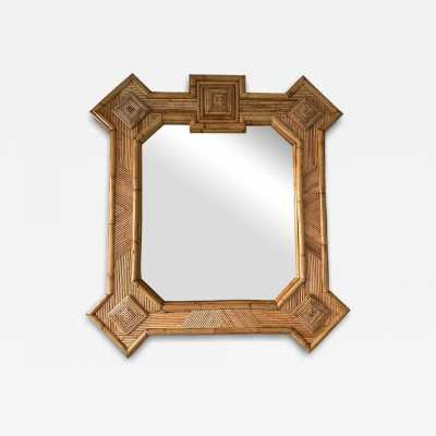 Large mid-century Hollywood Regency wall mirror made of bamboo, rattan, raffia, and wicker by the Italian manufacturer Vivai del Sud. Original manufacturer stamp on the back. Famous designs by Maison Arpex International, Dal Vera, Renato Zevi, Romeo Rega, Maison Jansen, brass palm, and Mario Sabot.