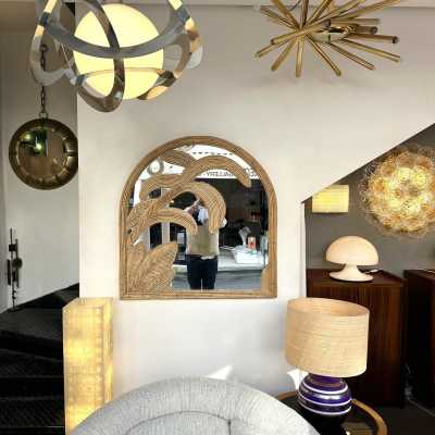 Palm tree wall mirror made of bamboo, rattan, raffia, and wicker by the Italian manufacturer Vivai del Sud. The manufacturer's original stamp is on the back. Famous designs by Maison Arpex International, Dal Vera, Renato Zevi, Romeo Rega, Maison Jansen, brass palm tree, and Mario Sabot.