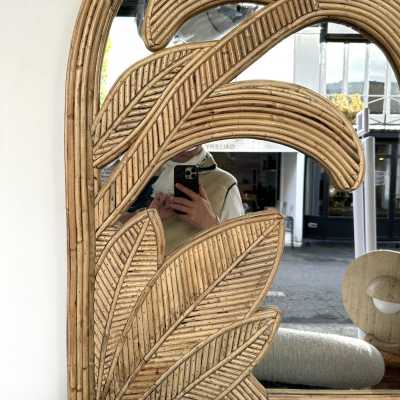 Palm tree wall mirror made of bamboo, rattan, raffia, and wicker by the Italian manufacturer Vivai del Sud. The manufacturer's original stamp is on the back. Famous designs by Maison Arpex International, Dal Vera, Renato Zevi, Romeo Rega, Maison Jansen, brass palm tree, and Mario Sabot.