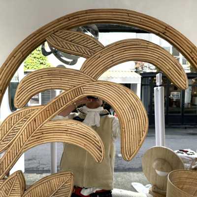 Palm tree wall mirror made of bamboo, rattan, raffia, and wicker by the Italian manufacturer Vivai del Sud. The manufacturer's original stamp is on the back. Famous designs by Maison Arpex International, Dal Vera, Renato Zevi, Romeo Rega, Maison Jansen, brass palm tree, and Mario Sabot.