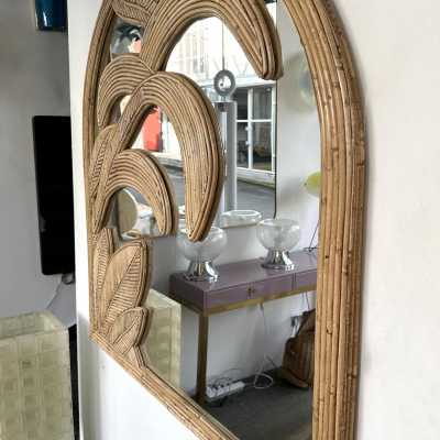 Palm tree wall mirror made of bamboo, rattan, raffia, and wicker by the Italian manufacturer Vivai del Sud. The manufacturer's original stamp is on the back. Famous designs by Maison Arpex International, Dal Vera, Renato Zevi, Romeo Rega, Maison Jansen, brass palm tree, and Mario Sabot.