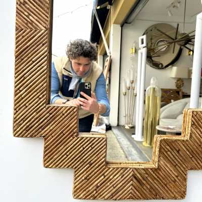 Rare pyramidal wall mirror made of bamboo, rattan, raffia, and wicker, from the Italian manufacturer Vivai del Sud. Original manufacturer's stamp on the back. Famous designers such as Maison Arpex International, Dal Vera, Renato Zevi, Romeo Rega, Palm Tree, Maison Jansen, Willy Rizzo, and Mario Sabot.