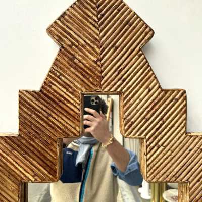 Rare pyramidal wall mirror made of bamboo, rattan, raffia, and wicker, from the Italian manufacturer Vivai del Sud. Original manufacturer's stamp on the back. Famous designers such as Maison Arpex International, Dal Vera, Renato Zevi, Romeo Rega, Palm Tree, Maison Jansen, Willy Rizzo, and Mario Sabot.