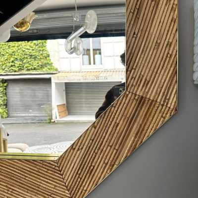 Mid-century modern octagonal wall mirror made of brass and bamboo, rattan, raffia, and wicker by the Italian manufacturer Vivai del Sud. Original manufacturer stamp on the back. Famous designs by Maison Arpex International, Dal Vera, Renato Zevi, Romeo Rega, Maison Jansen, Brass Palm, and Mario Sabot.