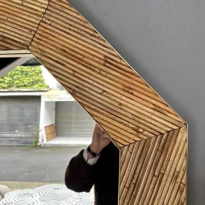 Mid-century modern octagonal wall mirror made of brass and bamboo, rattan, raffia, and wicker by the Italian manufacturer Vivai del Sud. Original manufacturer stamp on the back. Famous designs by Maison Arpex International, Dal Vera, Renato Zevi, Romeo Rega, Maison Jansen, Brass Palm, and Mario Sabot.