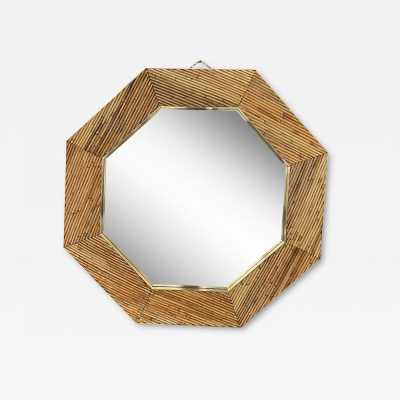 Mid-century modern octagonal wall mirror made of brass and bamboo, rattan, raffia, and wicker by the Italian manufacturer Vivai del Sud. Original manufacturer stamp on the back. Famous designs by Maison Arpex International, Dal Vera, Renato Zevi, Romeo Rega, Maison Jansen, Brass Palm, and Mario Sabot.