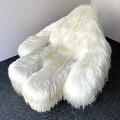 Rare, iconic mid-century modern space age design armchair, the Yeti Rocking Chair in wood and white goat hair fur by designer Mario Scheichenbauer for the Italian manufacturer Elam. New upholstery.