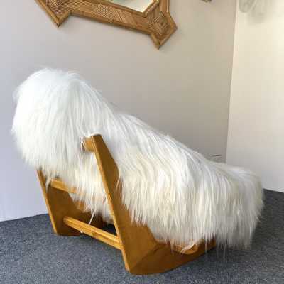 Rare, iconic mid-century modern space age design armchair, the Yeti Rocking Chair in wood and white goat hair fur by designer Mario Scheichenbauer for the Italian manufacturer Elam. New upholstery.