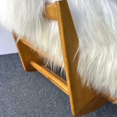Rare, iconic mid-century modern space age design armchair, the Yeti Rocking Chair in wood and white goat hair fur by designer Mario Scheichenbauer for the Italian manufacturer Elam. New upholstery.