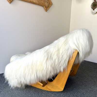 Rare, iconic mid-century modern space age design armchair, the Yeti Rocking Chair in wood and white goat hair fur by designer Mario Scheichenbauer for the Italian manufacturer Elam. New upholstery.