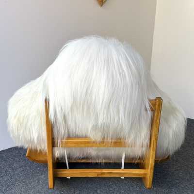 Rare, iconic mid-century modern space age design armchair, the Yeti Rocking Chair in wood and white goat hair fur by designer Mario Scheichenbauer for the Italian manufacturer Elam. New upholstery.