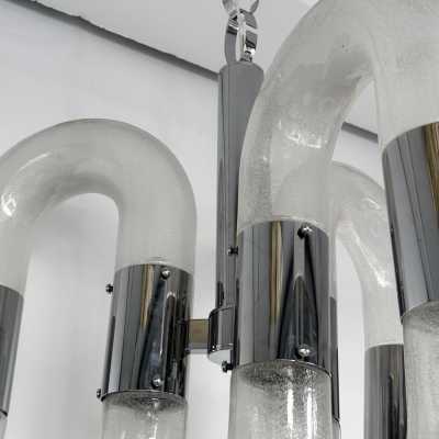 chrome metal space age of the chandelier suspended from the ceiling by Aldo Nason for Mazzega manufacturing. Bubble blown Murano glass. Famous manufactory like Venini, Vistosi, La Murrina, Seguso, Carlo Nason, Poliarte, Esperia, Angelo Brotto, Stilnovo, Arteluce, Arredoluce, Artemide, Pierre Cardin, Lumi, Luci, Raak, Angelo Lelii, Francesco Bocola, Superstudio, Enrico Tronconi, Mario Bellini, Harvey Guzzini, Luigi Massoni, Martinelli, Fabio Lenci, Gio Ponti.
