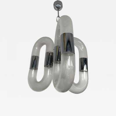 chrome metal space age of the chandelier suspended from the ceiling by Aldo Nason for Mazzega manufacturing. Bubble blown Murano glass. Famous manufactory like Venini, Vistosi, La Murrina, Seguso, Carlo Nason, Poliarte, Esperia, Angelo Brotto, Stilnovo, Arteluce, Arredoluce, Artemide, Pierre Cardin, Lumi, Luci, Raak, Angelo Lelii, Francesco Bocola, Superstudio, Enrico Tronconi, Mario Bellini, Harvey Guzzini, Luigi Massoni, Martinelli, Fabio Lenci, Gio Ponti.