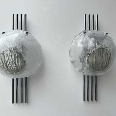 Pair of Space Age Mid-Century Modern wall lights in chrome metal and textured glass by Italian designer Angelo Brotto for the Esperia manufacture. Famous design Venini, La Murrina, Seguso, Carlo Aldo Nason, Poliarte, Stilnovo, Arteluce, Arredoluce, Artemide, Pierre Cardin, Lumi, Luci, Raak, Angelo Lelii, Francesco Bocola, Superstudio, Enrico Tronconi, Mario Bellini, Harvey Guzzini, Luigi Massoni, Martinelli, Fabio Lenci, Gio Ponti.