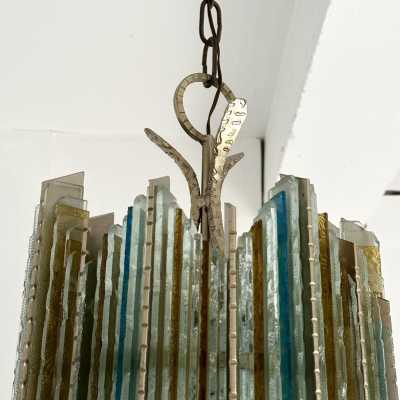 Mid-century modern chandeliers and pendants in hammered glass and silver-plated wrought iron from the Biancardi Jordan factory in Verona, in the Brutalist style, a competitor of Longobard Arte and Poliarte in the 1970s. Famous designers, such as Carlo Aldo Nason for Mazzega Murano, Venini, Vistosi, La Murrina, Esperia and Angelo Brotto.