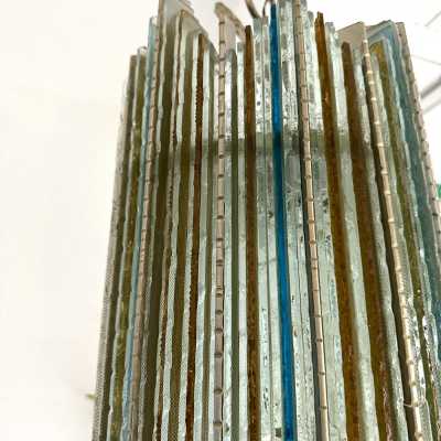 Mid-century modern chandeliers and pendants in hammered glass and silver-plated wrought iron from the Biancardi Jordan factory in Verona, in the Brutalist style, a competitor of Longobard Arte and Poliarte in the 1970s. Famous designers, such as Carlo Aldo Nason for Mazzega Murano, Venini, Vistosi, La Murrina, Esperia and Angelo Brotto.