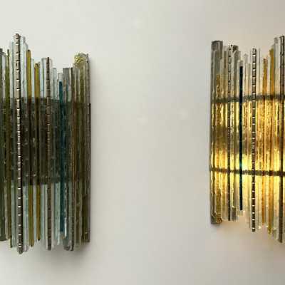 Mid-century modern wall sconces in hammered glass and wrought iron, with a golden patina, from the Biancardi Jordan factory in Verona, in the brutalist style, a competitor of Longobard Arte and Poliarte in the 1970s. Famous designers include Carlo Aldo Nason for Mazzega Murano, Venini, Vistosi, La Murrina, Esperia and Angelo Brotto.