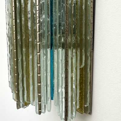 Mid-century modern wall sconces in hammered glass and wrought iron, with a golden patina, from the Biancardi Jordan factory in Verona, in the brutalist style, a competitor of Longobard Arte and Poliarte in the 1970s. Famous designers include Carlo Aldo Nason for Mazzega Murano, Venini, Vistosi, La Murrina, Esperia and Angelo Brotto.