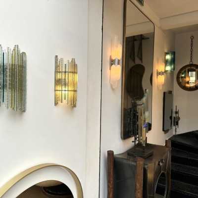 Mid-century modern wall sconces in hammered glass and wrought iron, with a golden patina, from the Biancardi Jordan factory in Verona, in the brutalist style, a competitor of Longobard Arte and Poliarte in the 1970s. Famous designers include Carlo Aldo Nason for Mazzega Murano, Venini, Vistosi, La Murrina, Esperia and Angelo Brotto.